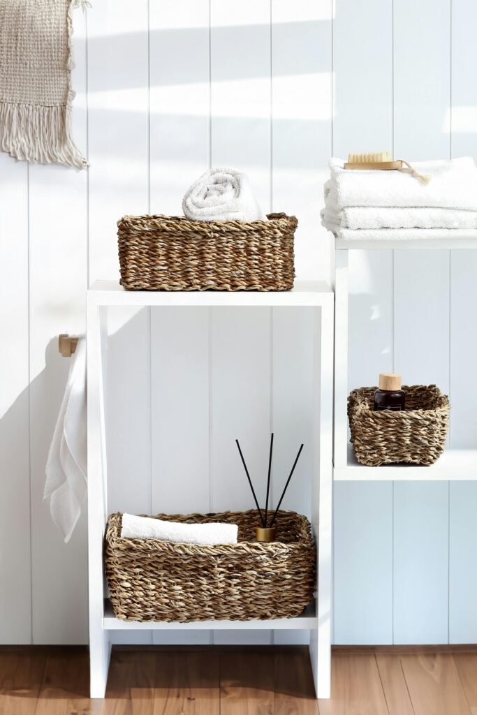 pexels-photo-31390644-31390644 Stylish bathroom storage with wicker baskets on shelves, adding a natural touch to home decor.
